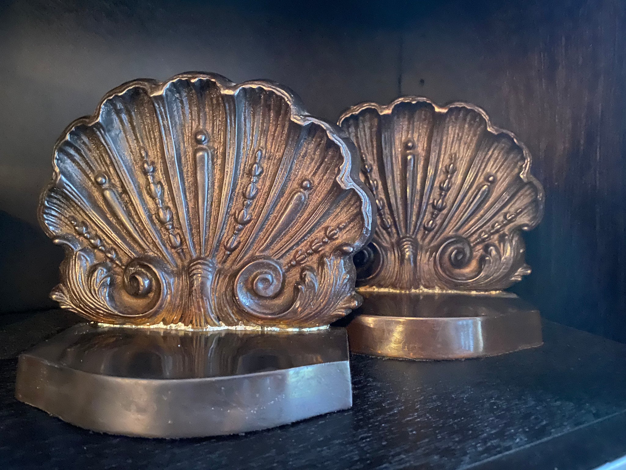 Pair of brass shell bookends